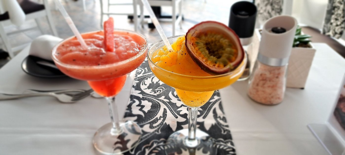 Frozen strawberry and passion fruit daiquiris